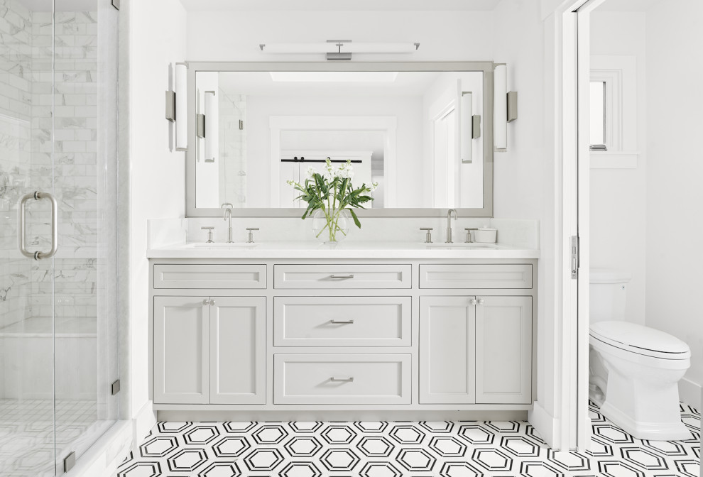 Example of a transitional master multicolored floor and double-sink bathroom design in San Francisco with recessed-panel cabinets, gray cabinets, white walls, an undermount sink, white countertops and a built-in vanity