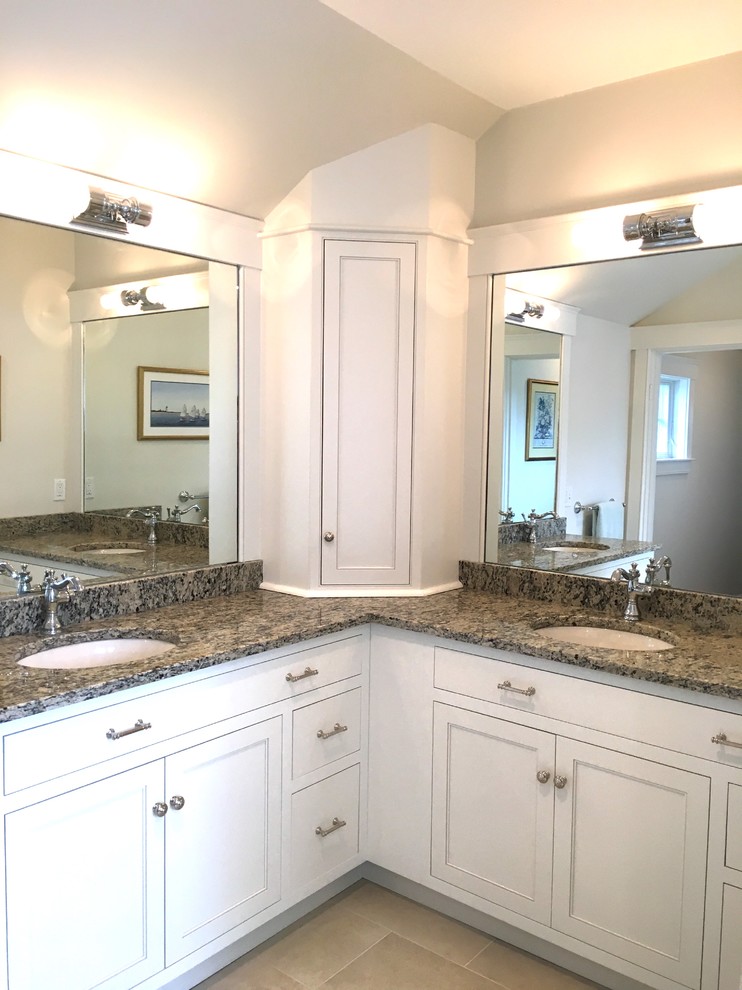 Photo of a medium sized classic ensuite bathroom in Boston with beaded cabinets, white cabinets, a claw-foot bath, an alcove shower, a two-piece toilet, white walls, limestone flooring, a submerged sink, granite worktops, beige floors, a hinged door and beige worktops.