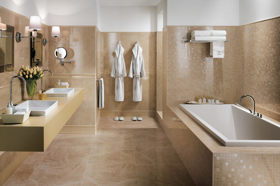 Bathroom - mid-sized contemporary master beige tile and mosaic tile porcelain tile bathroom idea in Denver with white walls, a drop-in sink and solid surface countertops