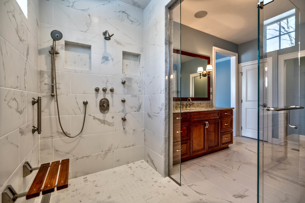 Large elegant master black and white tile and ceramic tile ceramic tile and white floor walk-in shower photo in Other with flat-panel cabinets, brown cabinets, a bidet, blue walls, an undermount sink, granite countertops and a hinged shower door