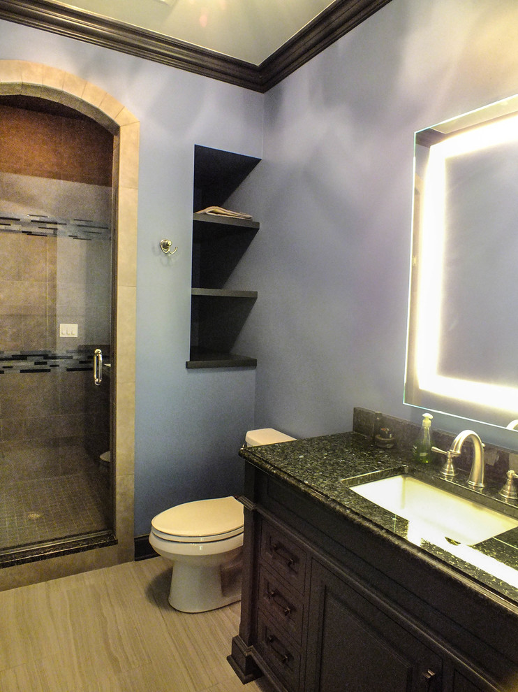 На фото: огромная детская ванная комната в классическом стиле с серыми стенами, полом из керамогранита, врезной раковиной, темными деревянными фасадами, столешницей из гранита, душем в нише, бежевой плиткой и керамической плиткой