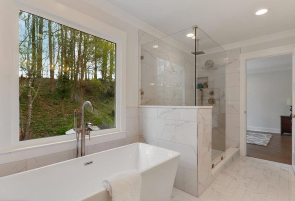 Example of a mid-sized cottage master gray tile and marble tile porcelain tile and gray floor bathroom design in Other with shaker cabinets, white cabinets, a two-piece toilet, gray walls, a console sink, marble countertops and white countertops