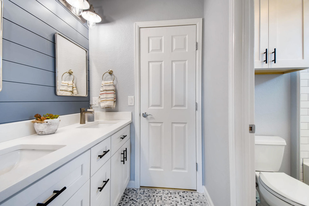 Inspiration for a large country master white tile and ceramic tile ceramic tile and white floor bathroom remodel in Denver with shaker cabinets, gray cabinets, white walls, quartz countertops, a hinged shower door and white countertops