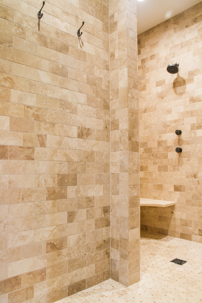 Inspiration pour une grande salle de bain principale design avec un placard à porte plane, des portes de placard beiges, une baignoire sur pieds, un espace douche bain, WC séparés, un carrelage beige, des carreaux de céramique, un mur beige, un sol en carrelage de céramique, un lavabo encastré et un plan de toilette en granite.
