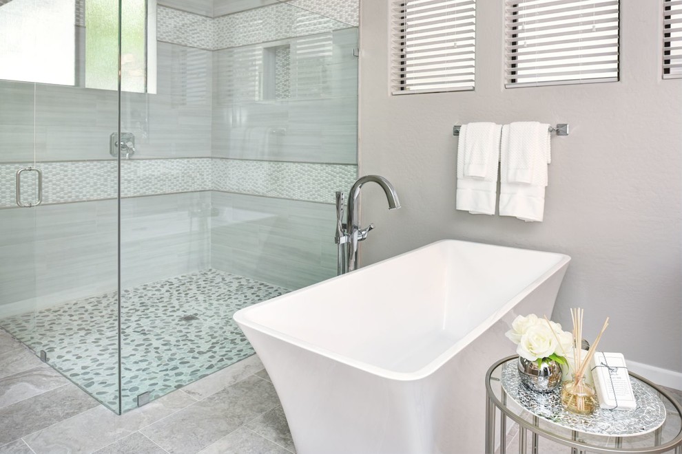 Photo of a large classic ensuite bathroom in Phoenix with grey cabinets, a freestanding bath, a corner shower, grey tiles, mosaic tiles, grey walls, porcelain flooring, a submerged sink, quartz worktops and a hinged door.