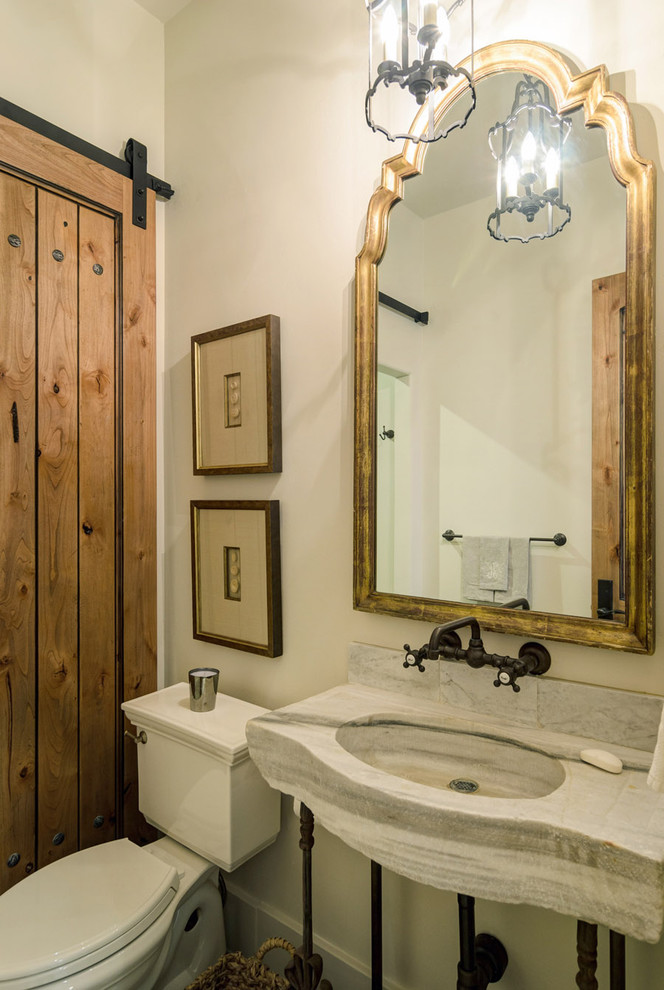 Design ideas for a rustic bathroom in Austin with a console sink and a two-piece toilet.