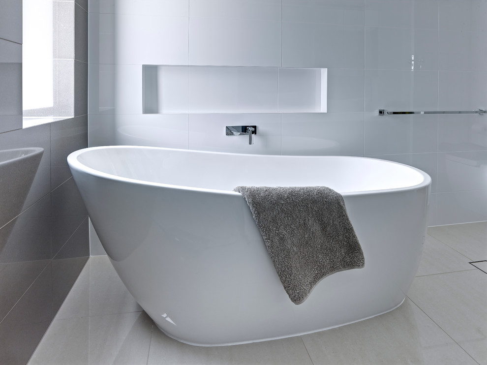 This is an example of a small contemporary ensuite bathroom in Other with a vessel sink, dark wood cabinets, a freestanding bath, a walk-in shower, porcelain tiles, white walls and porcelain flooring.