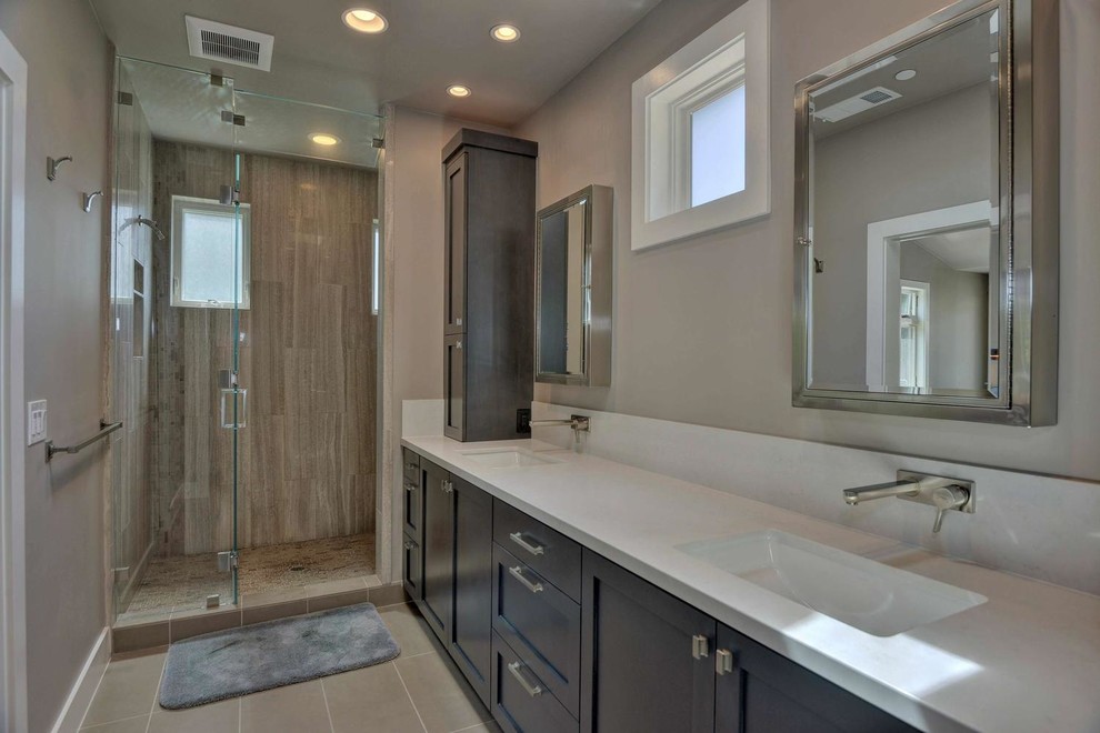 Transitional master gray tile porcelain tile alcove shower photo in San Francisco with shaker cabinets, dark wood cabinets, quartzite countertops, an undermount sink and gray walls