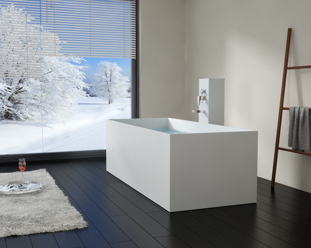 Ispirazione per una grande stanza da bagno padronale minimalista con vasca freestanding