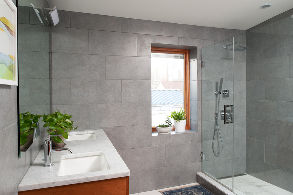 Inspiration for a mid-sized modern master gray tile ceramic tile bathroom remodel in Philadelphia with an undermount sink and marble countertops