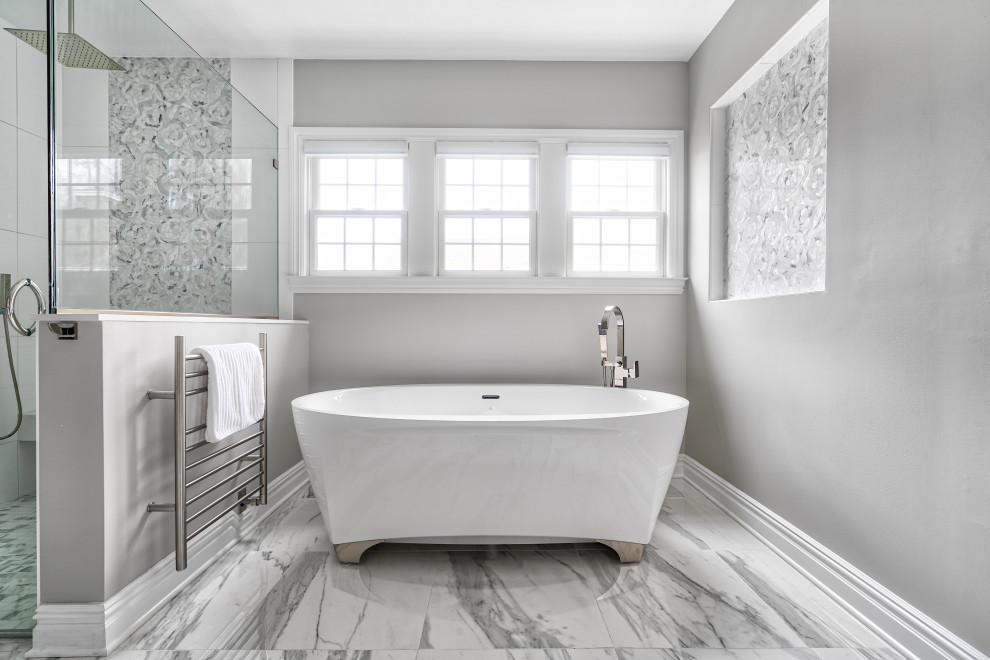 Inspiration for a huge transitional master white tile and porcelain tile marble floor bathroom remodel in New York with shaker cabinets, white cabinets, a bidet, beige walls, an undermount sink, quartzite countertops, a hinged shower door and white countertops