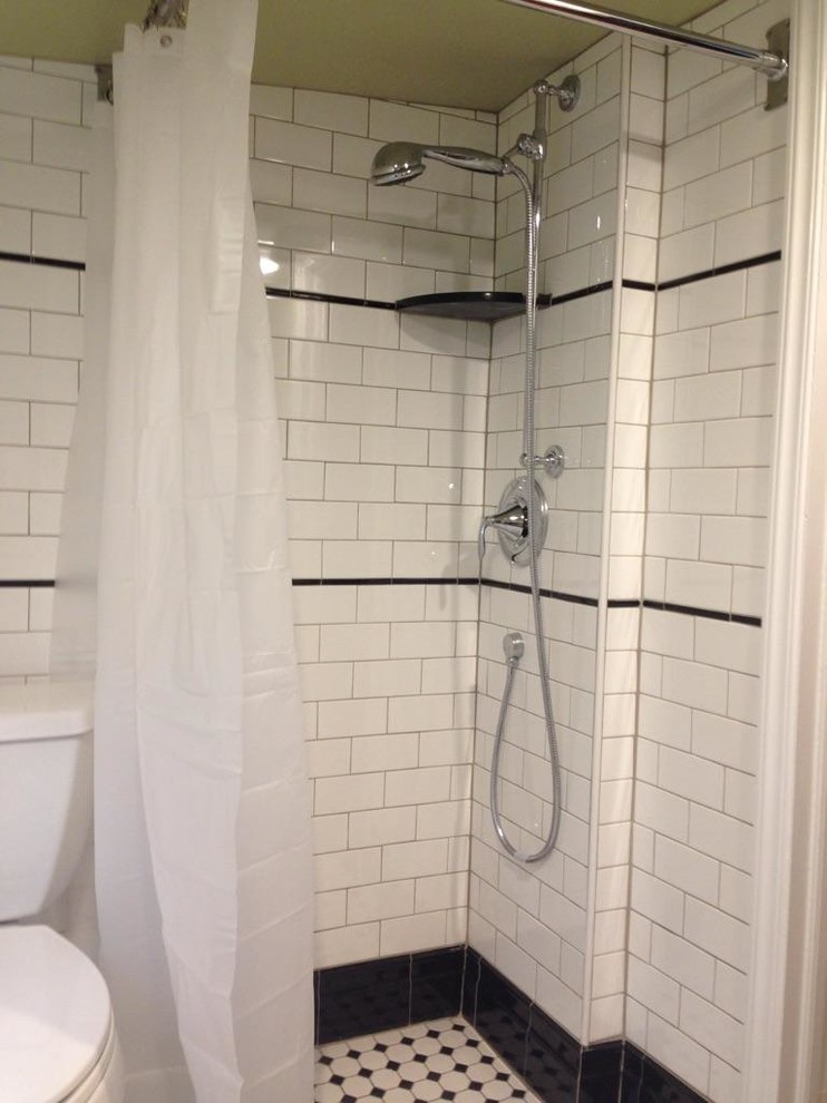 Photo of a small victorian wet room bathroom in Philadelphia with a two-piece toilet, white tiles, metro tiles, green walls, mosaic tile flooring and a wall-mounted sink.