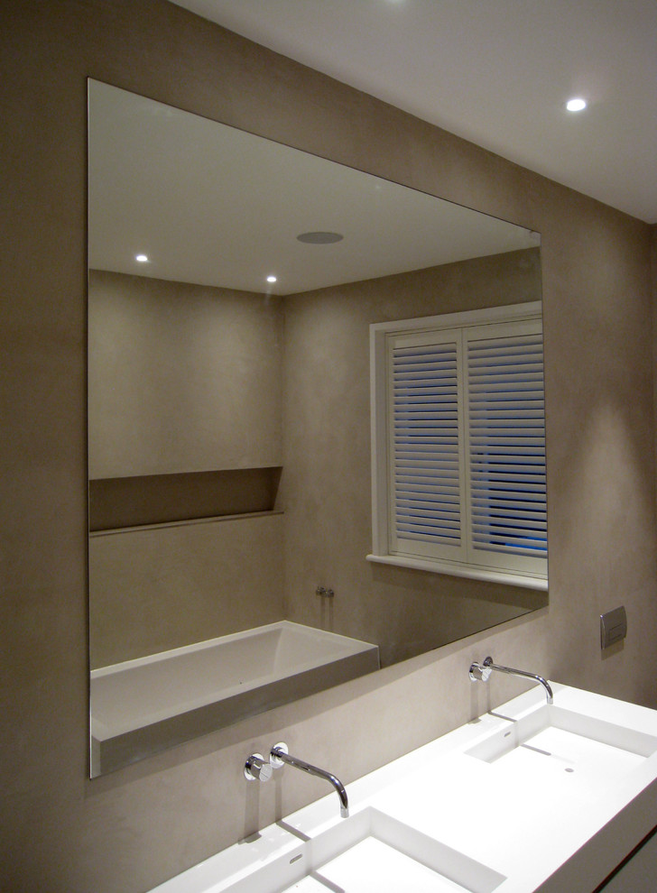Design ideas for an expansive contemporary bathroom in London with grey walls.