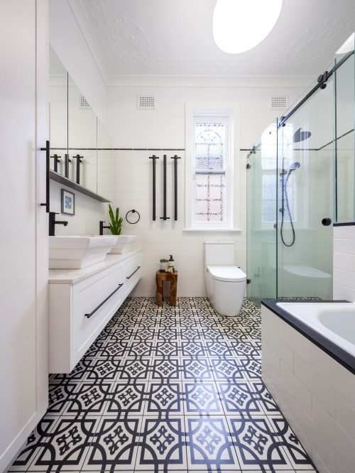 Black and White Bathroom with Traditional Patterned Floor Tiles