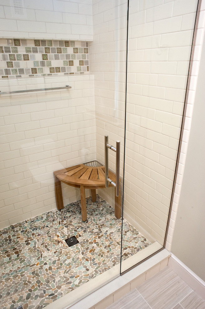 Example of a mid-sized trendy ceramic tile bathroom design in Boston with a trough sink, flat-panel cabinets, medium tone wood cabinets, concrete countertops, a two-piece toilet and beige walls