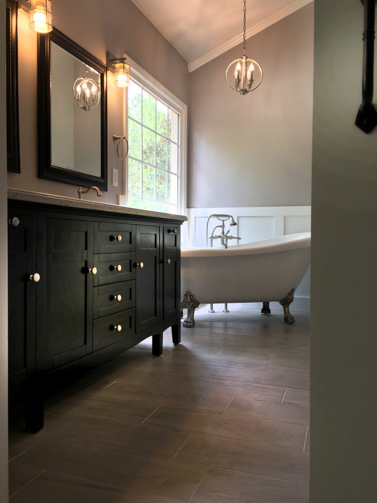Design ideas for a large traditional ensuite bathroom in Atlanta with shaker cabinets, black cabinets, a claw-foot bath, an alcove shower, black and white tiles, cement tiles, grey walls, cement flooring, a submerged sink, marble worktops, grey floors, a hinged door and white worktops.