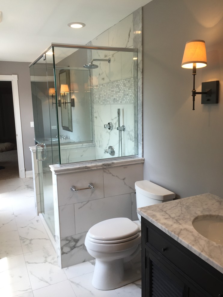 Doorless shower - mid-sized transitional kids' gray tile and stone tile marble floor doorless shower idea in Chicago with louvered cabinets, dark wood cabinets, a two-piece toilet, gray walls, an undermount sink and marble countertops