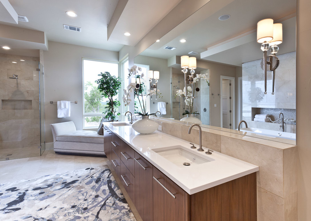 Example of a mid-sized transitional master beige tile and travertine tile travertine floor bathroom design in Nashville with flat-panel cabinets, medium tone wood cabinets, beige walls, an undermount sink and quartz countertops