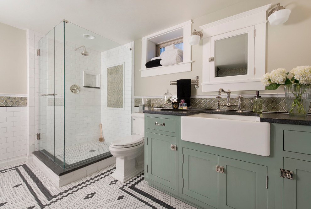 Corner shower - large traditional corner shower idea in Denver with beige walls, a vessel sink, shaker cabinets and green cabinets