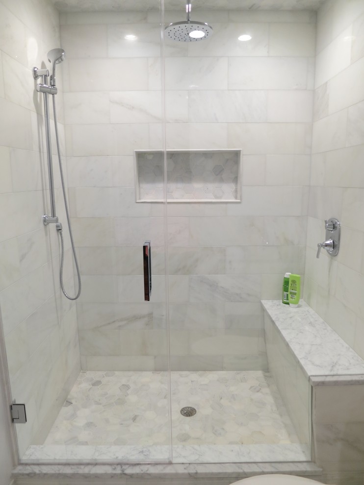 Mid-sized transitional 3/4 multicolored tile and stone tile marble floor doorless shower photo in Chicago with shaker cabinets, white cabinets, a one-piece toilet, white walls, an undermount sink and marble countertops