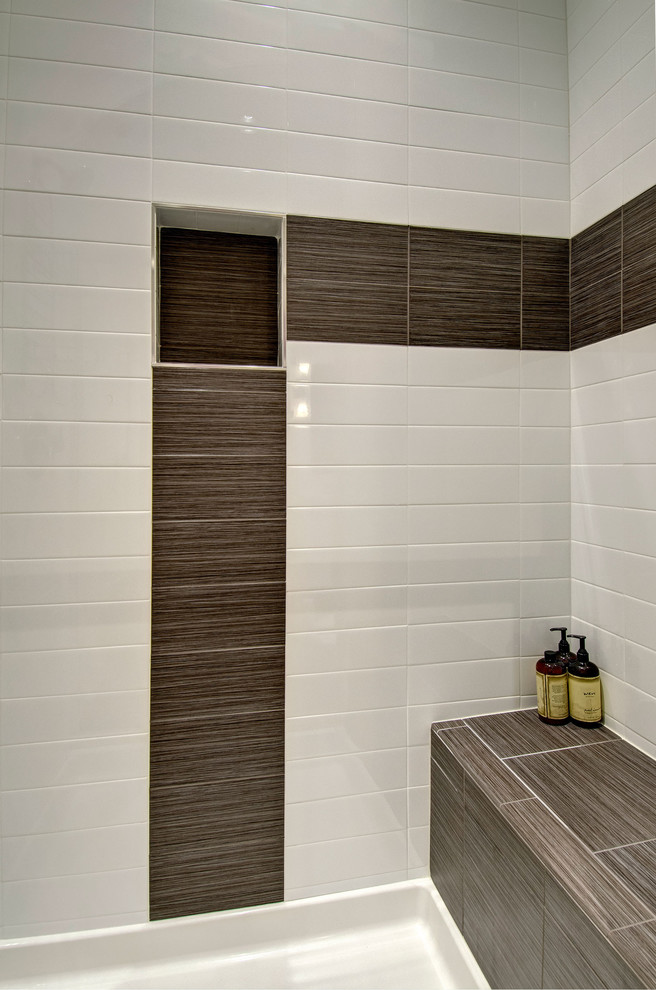 Alcove shower - mid-sized contemporary 3/4 porcelain tile and gray floor alcove shower idea in Denver with flat-panel cabinets, white cabinets, a two-piece toilet, white walls, an integrated sink, quartz countertops, a hinged shower door and white countertops