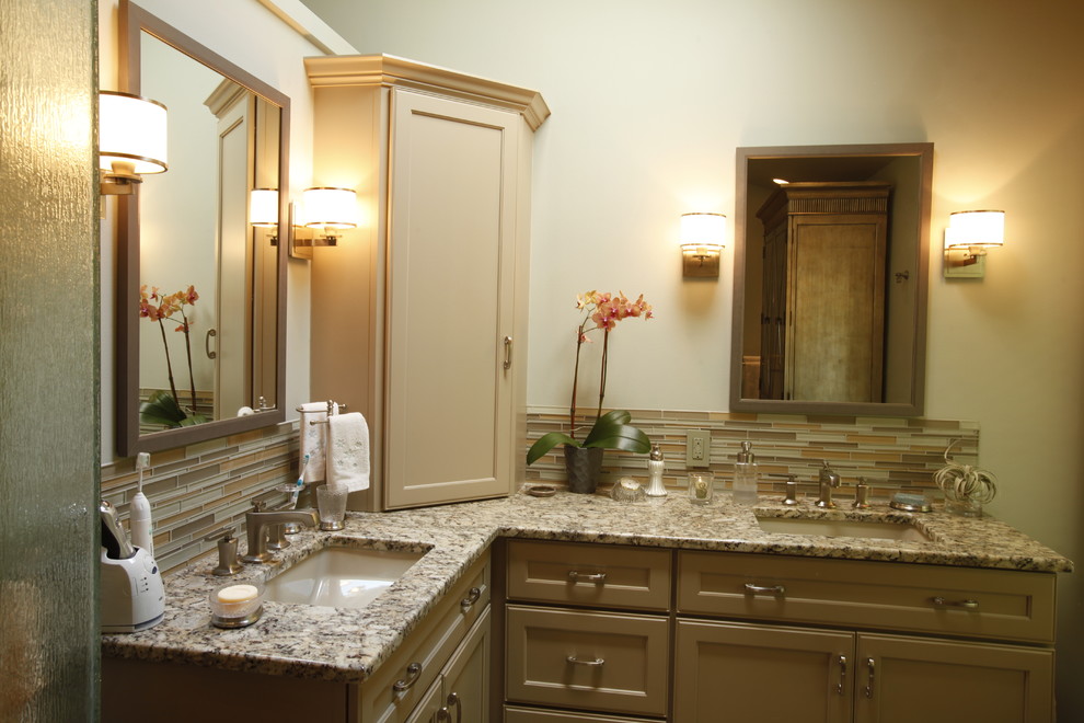 Eclectic master beige tile and ceramic tile ceramic tile bathroom photo in Columbus with an undermount sink, flat-panel cabinets, beige cabinets, granite countertops and beige walls