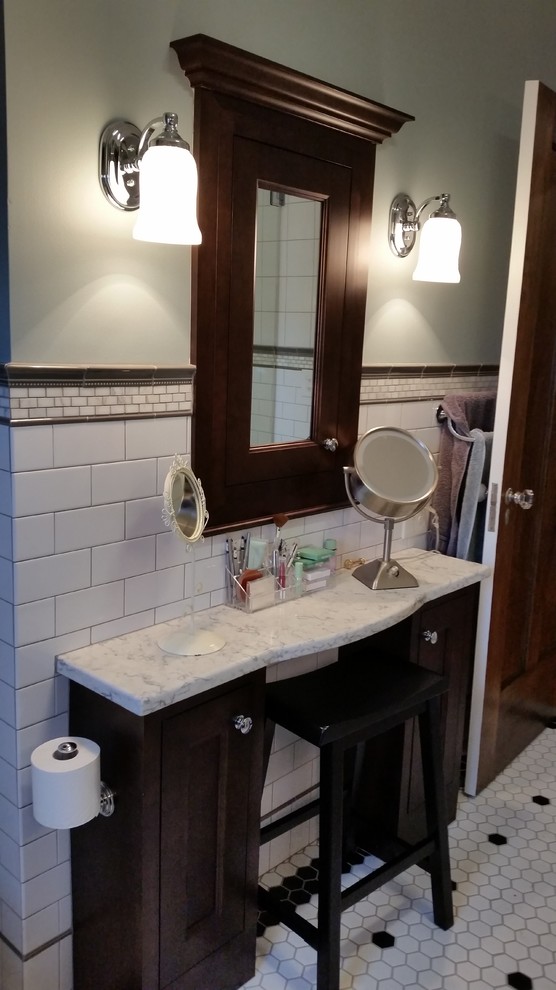 Example of a mid-sized arts and crafts master white tile and ceramic tile ceramic tile bathroom design in Columbus with an undermount sink, shaker cabinets, dark wood cabinets, quartz countertops, a two-piece toilet and green walls