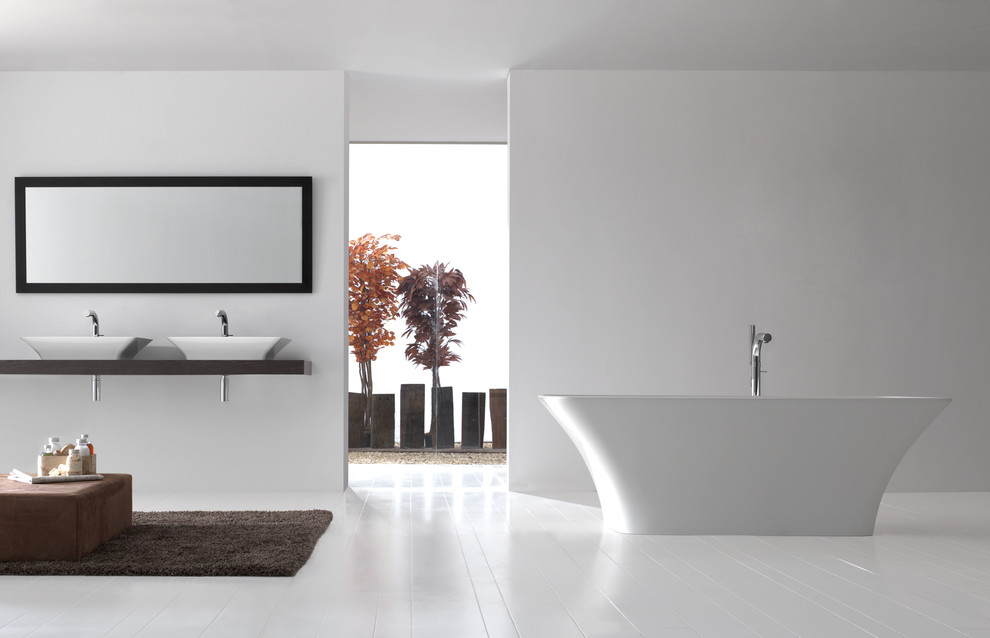Design ideas for a modern bathroom in Dallas with a freestanding bath and a vessel sink.