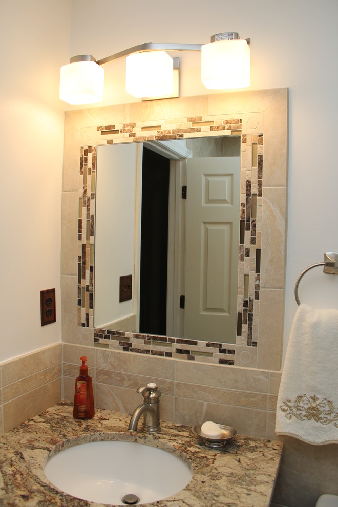 Bathroom - small traditional 3/4 beige tile, black and white tile and mosaic tile bathroom idea in DC Metro with white walls, an undermount sink and granite countertops