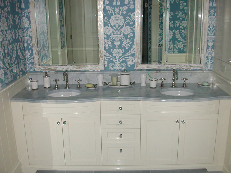 Inspiration for a mid-sized timeless master marble floor bathroom remodel in Boston with an undermount sink and marble countertops