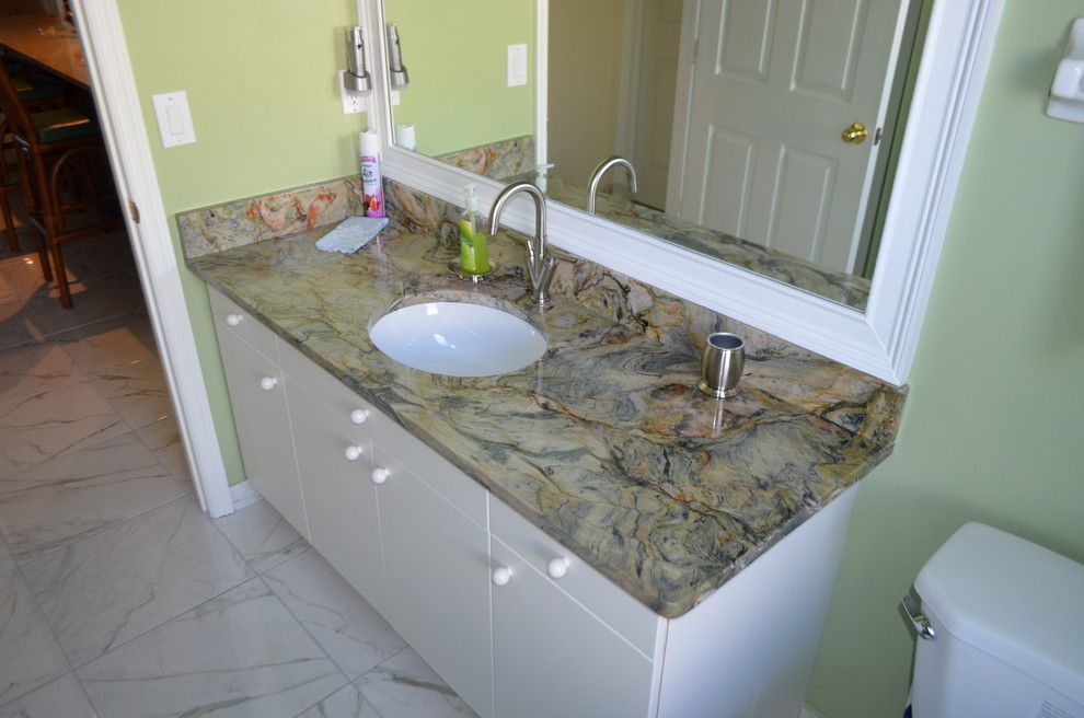 Example of an island style bathroom design in Tampa