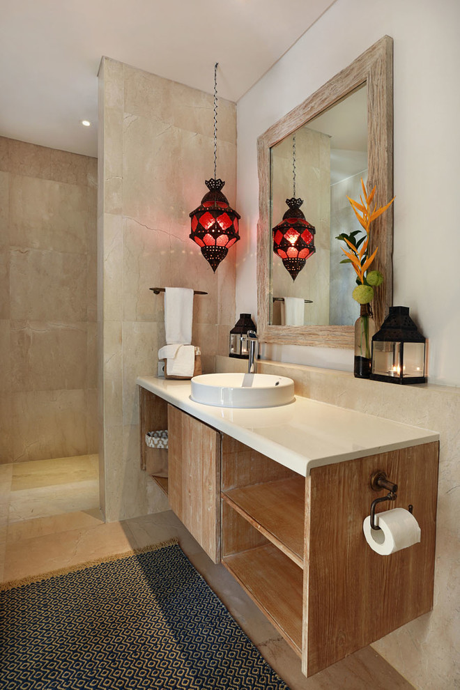 Small world-inspired shower room bathroom in Other with a vessel sink, open cabinets, light wood cabinets, engineered stone worktops, an alcove shower, a one-piece toilet, white tiles, stone tiles, white walls and marble flooring.