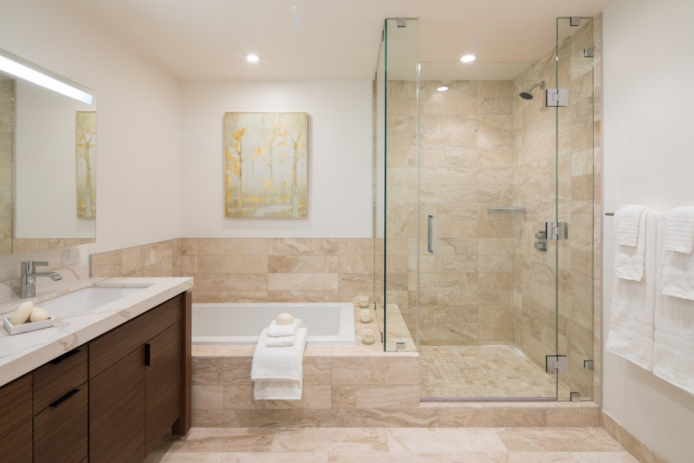 Photo of an expansive contemporary ensuite bathroom in Sacramento with flat-panel cabinets, brown cabinets, a corner shower, a two-piece toilet, black and white tiles, glass tiles, ceramic flooring, a submerged sink, granite worktops, beige floors, a hinged door, white worktops, double sinks, a floating vanity unit, a built-in bath and beige walls.
