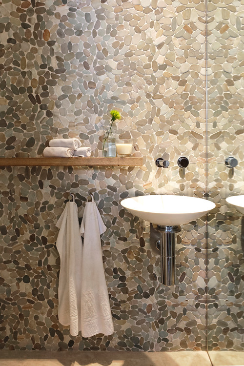 Cozy Powder Room Elegance with Wall-Mounted Sink