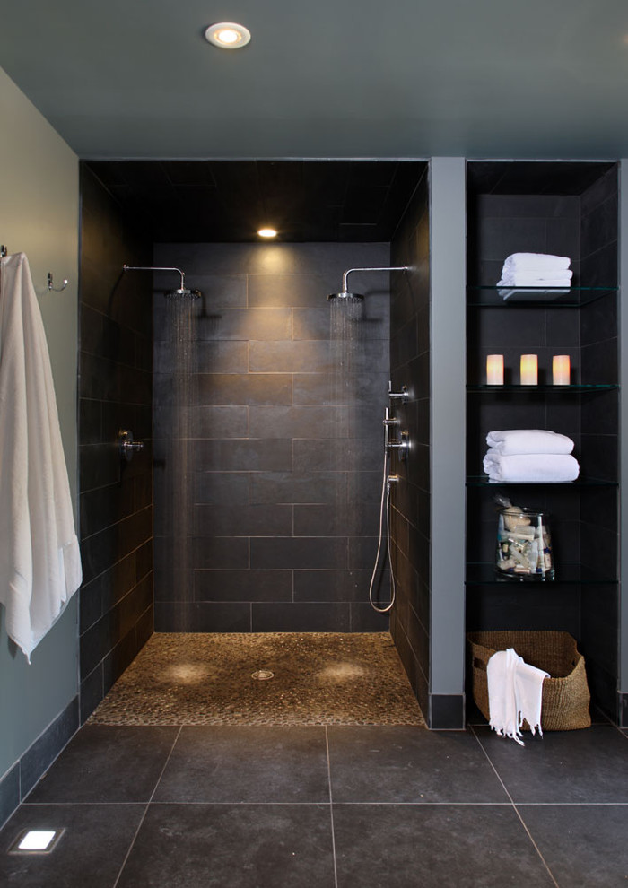 Design ideas for a contemporary bathroom in DC Metro with pebble tile flooring, a double shower and feature lighting.