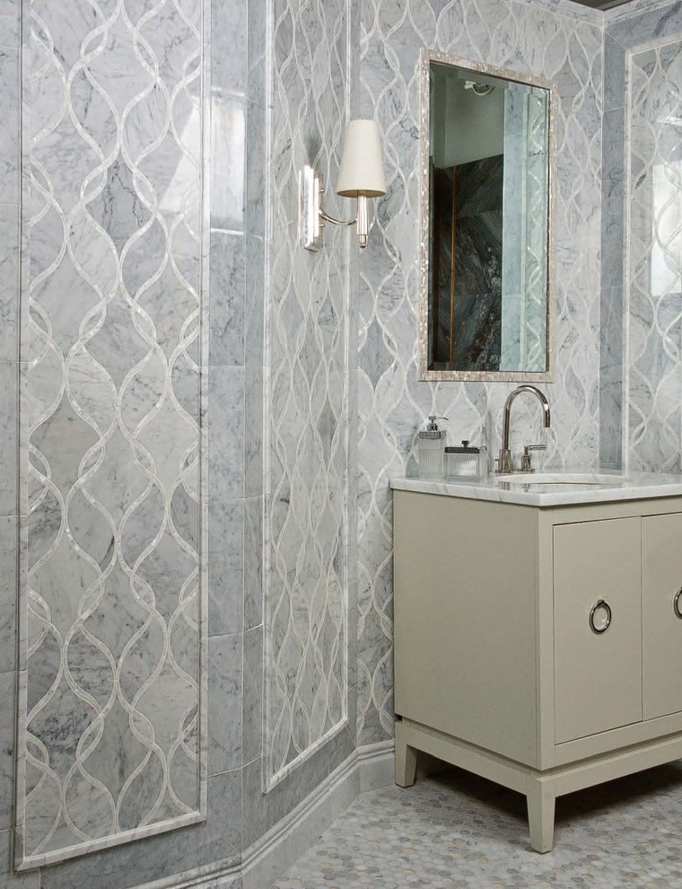 Alcove shower - large contemporary master gray tile and mosaic tile ceramic tile alcove shower idea in New York with flat-panel cabinets, beige cabinets, gray walls, a drop-in sink and marble countertops