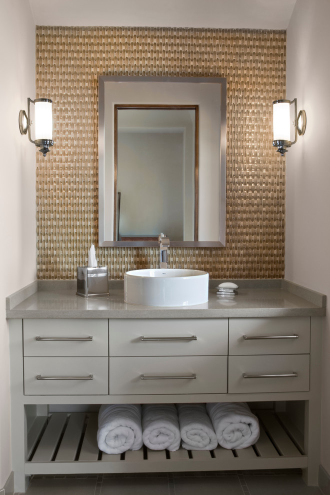 Design ideas for a large classic bathroom in Houston with a vessel sink, flat-panel cabinets, grey cabinets, beige tiles, white walls, ceramic flooring and solid surface worktops.