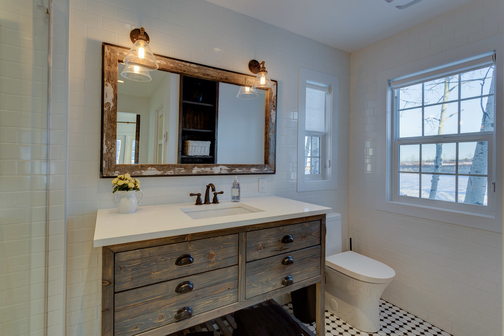 Inspiration for a small country ensuite bathroom in Calgary with open cabinets, distressed cabinets, white tiles, ceramic tiles, white walls, ceramic flooring and engineered stone worktops.