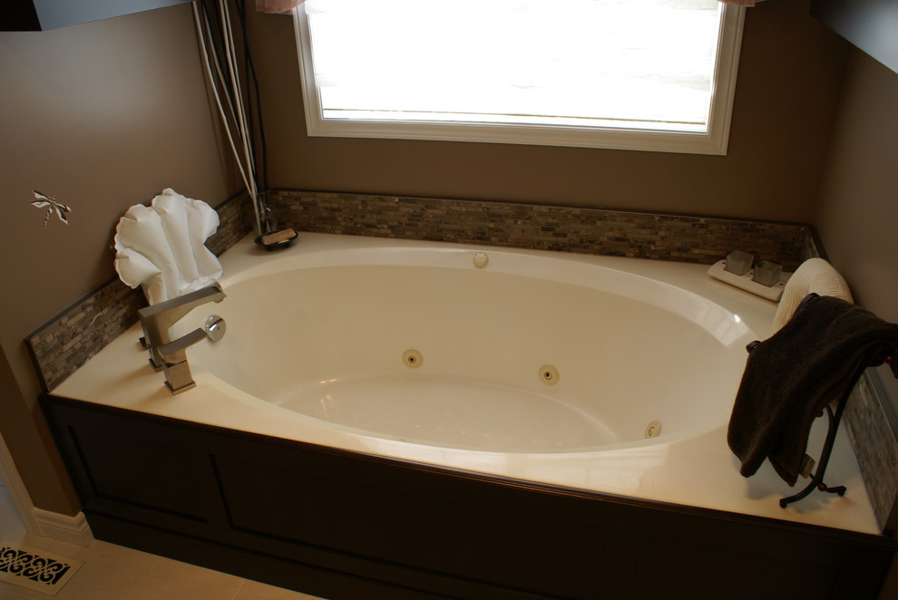This is an example of a large modern bathroom in Other with dark wood cabinets, ceramic tiles, beige walls, ceramic flooring, a japanese bath and multi-coloured tiles.