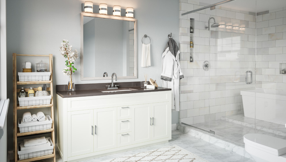 Inspiration for a large contemporary master gray tile and stone tile marble floor and gray floor bathroom remodel in Milwaukee with shaker cabinets, white cabinets, a one-piece toilet, gray walls, an integrated sink, marble countertops and a hinged shower door