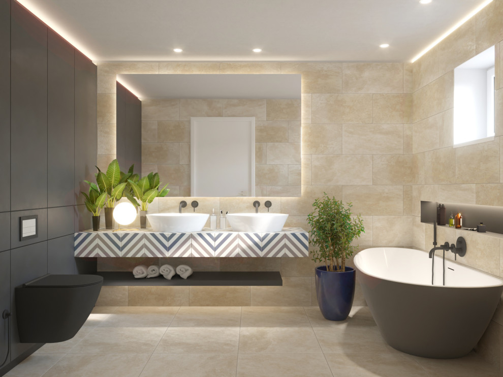 Idéer för mellanstora funkis flerfärgat en-suite badrum, med ett fristående badkar, en dusch/badkar-kombination, vit kakel, keramikplattor, vita väggar, en vägghängd toalettstol, cementgolv, ett piedestal handfat, kaklad bänkskiva och beiget golv