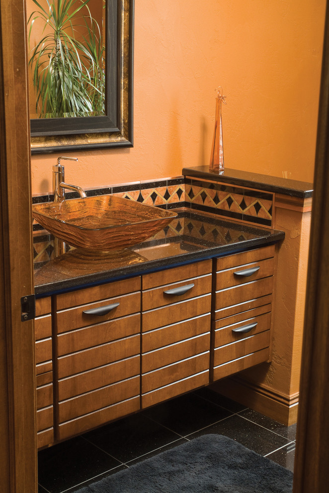 Inspiration for a mediterranean bathroom remodel in Milwaukee with a vessel sink