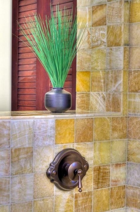 Mid-sized elegant master beige tile, brown tile and ceramic tile ceramic tile doorless shower photo in Miami with flat-panel cabinets, dark wood cabinets, a one-piece toilet, beige walls, a drop-in sink and soapstone countertops