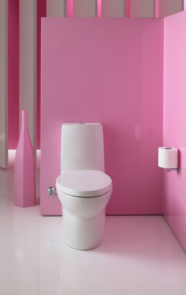 Kleine Moderne Gästetoilette mit Toilette mit Aufsatzspülkasten und rosa Wandfarbe in Sonstige