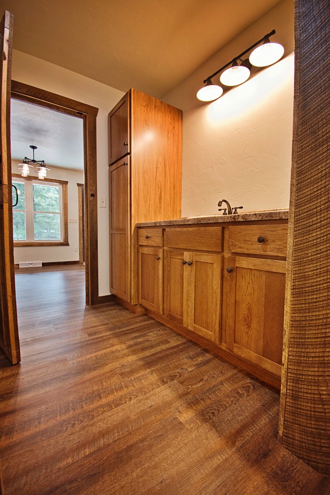 Example of a large mountain style bathroom design in Other