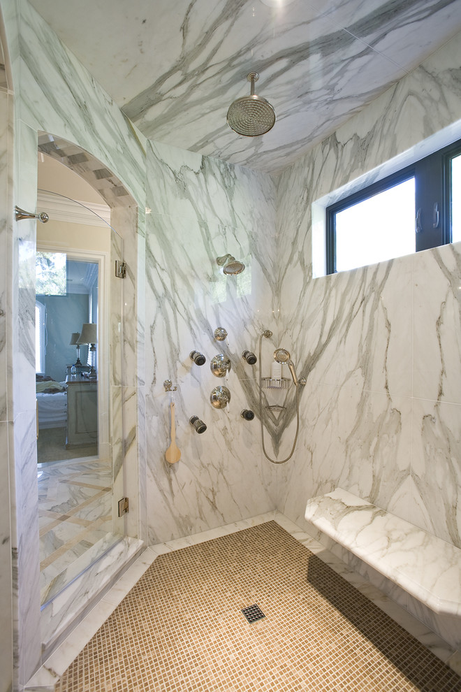 Inspiration for a large traditional ensuite bathroom in DC Metro with a walk-in shower, stone slabs, mosaic tile flooring, a hinged door and brown floors.