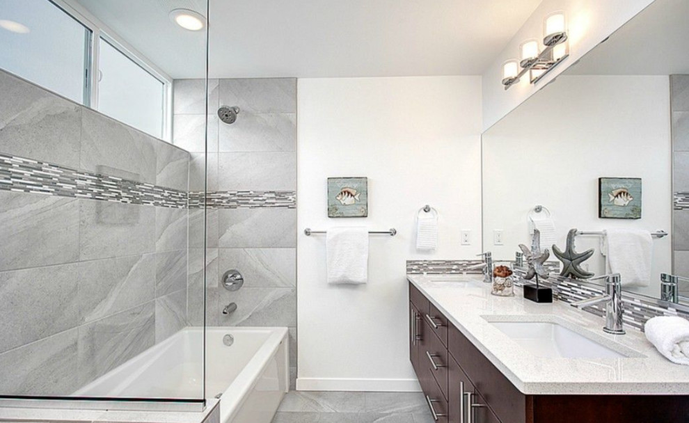 Bathroom - mid-sized contemporary master stone tile marble floor bathroom idea in Newark with flat-panel cabinets, medium tone wood cabinets, white walls, an undermount sink and quartz countertops