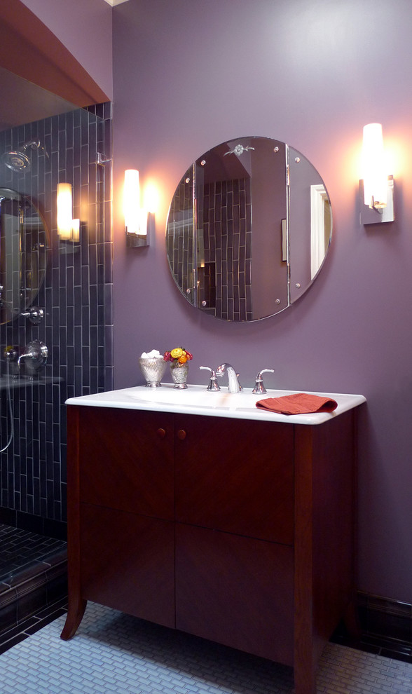 Small transitional master multicolored tile and ceramic tile ceramic tile doorless shower photo in San Francisco with an integrated sink, flat-panel cabinets, medium tone wood cabinets, solid surface countertops, purple walls and a two-piece toilet
