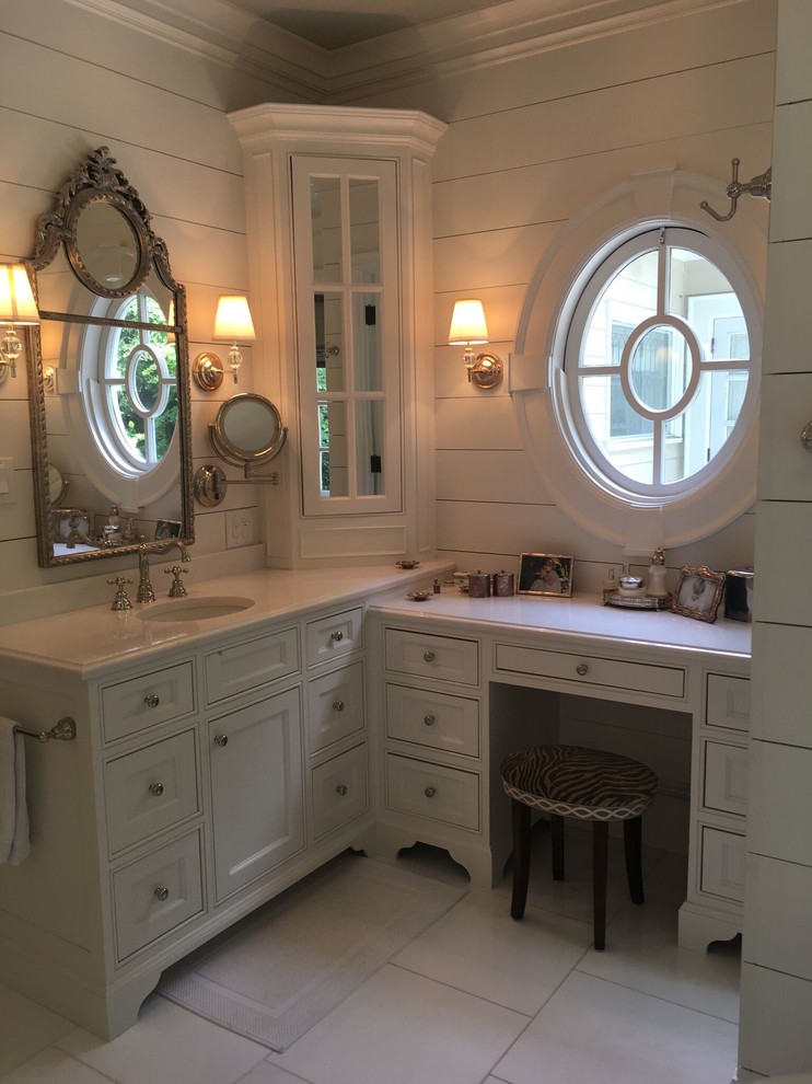 Example of a mid-sized classic master ceramic tile and white floor bathroom design in Atlanta with shaker cabinets, white cabinets, beige walls and an undermount sink