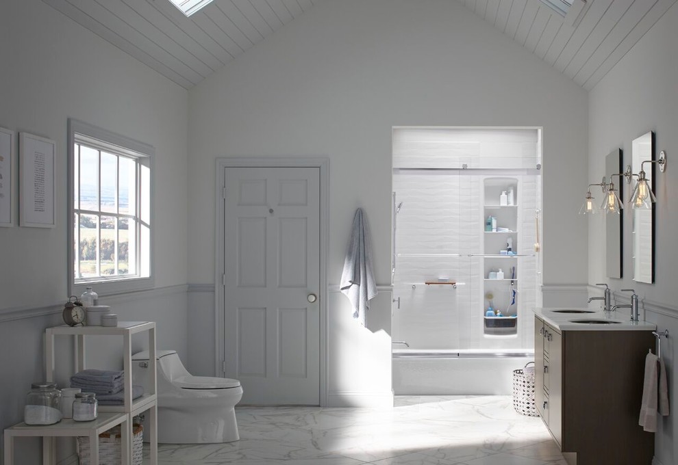Design ideas for a classic ensuite bathroom in Seattle with a shower/bath combination, flat-panel cabinets, medium wood cabinets, an alcove bath, a one-piece toilet, white walls, a submerged sink and a sliding door.